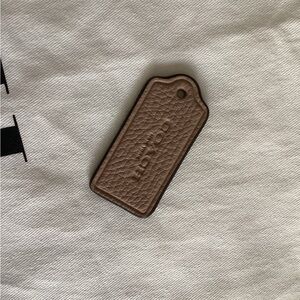 Coach Hang Tag